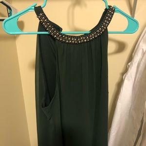 Green tank top with jewels on collar